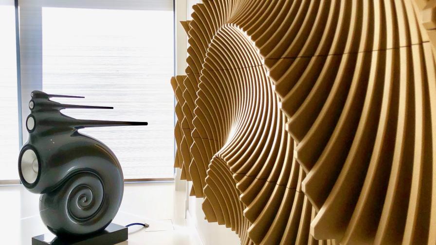 Image shows a loudspeaker with ammonite shaped acoustic treatment.