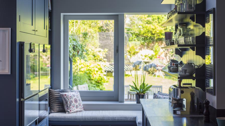 Kitchen window bench within a Shaker style kitchen