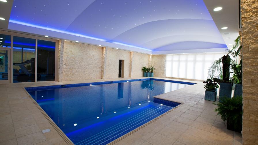 Pool with lighting control and audio video system.